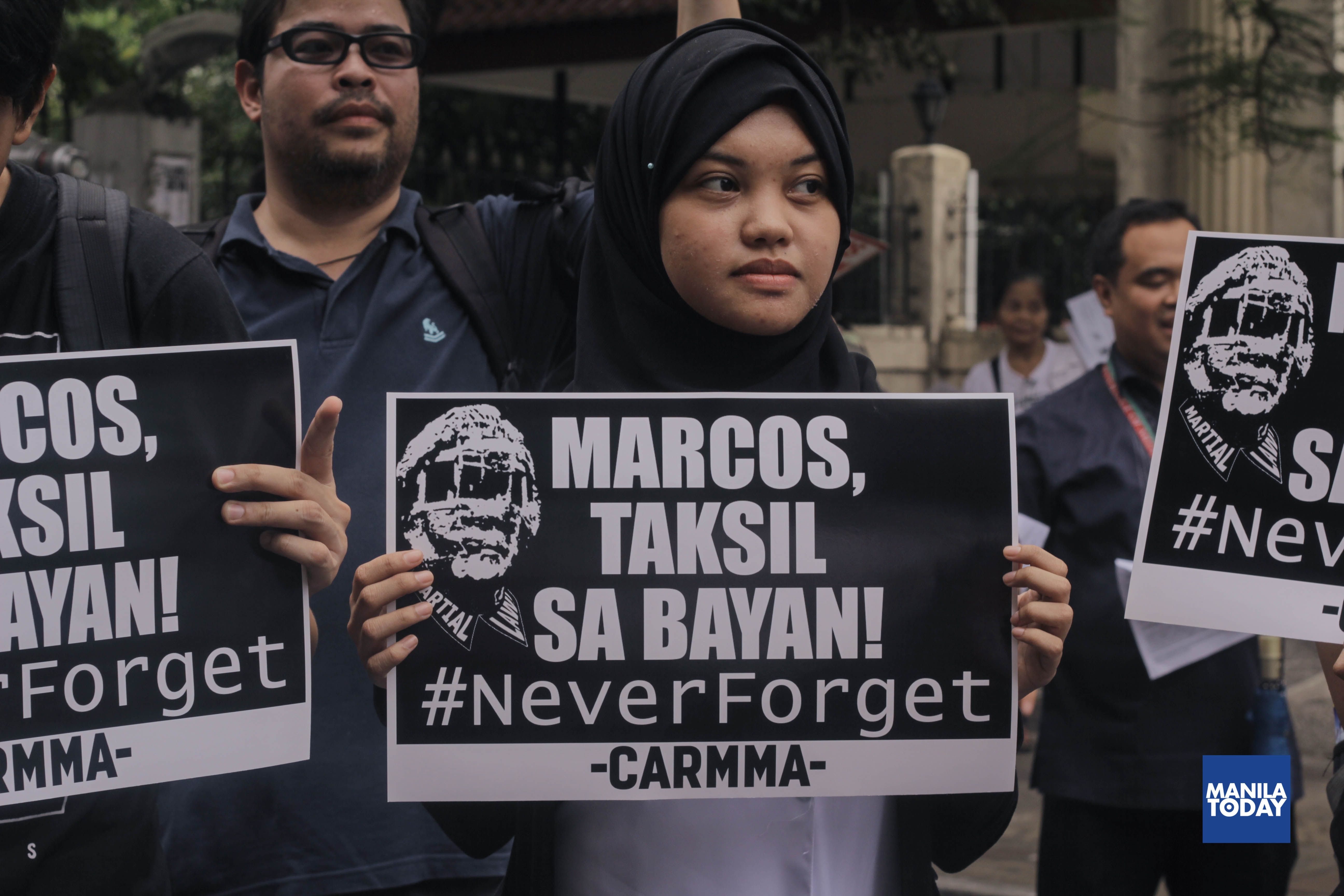 UP Manila students, health workers rally along Taft Avenue to condemn Marcos' surprise hero's burial at the LNMB today. (Manila Today photo/Joolia Demigillo)