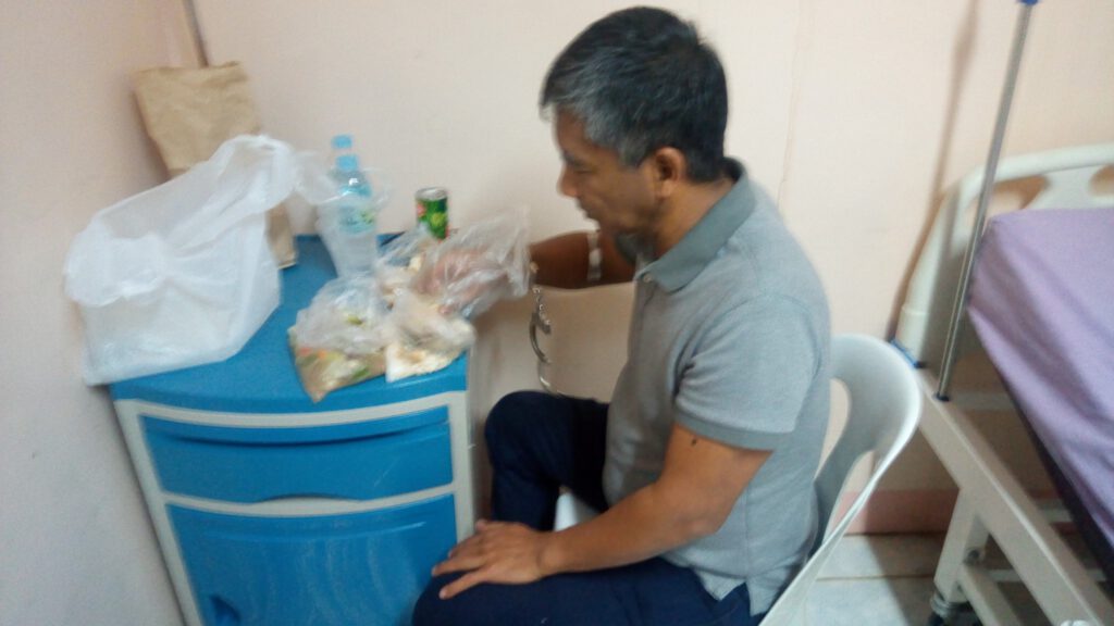 Due to very poor health, Ferdinand Castillo has a very limited diet. He was still wearing handcuffs while eating after several hours of interrogation. (Contributed photo)