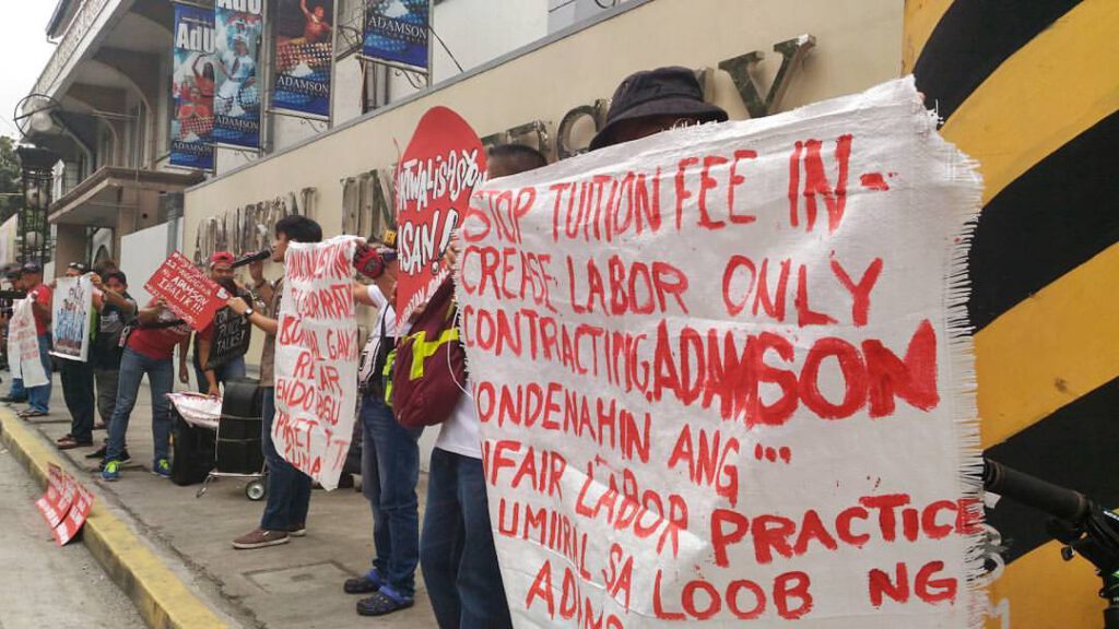 Nagpiket protest ang mga manggagawa at estudyante ng Adamson University laban sa pagtanggal sa 12 na manggagawa. (Tudla Productions/Erika Cruz)