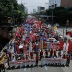 Different workers organisation marched together. Photo by Akira Liwanag
